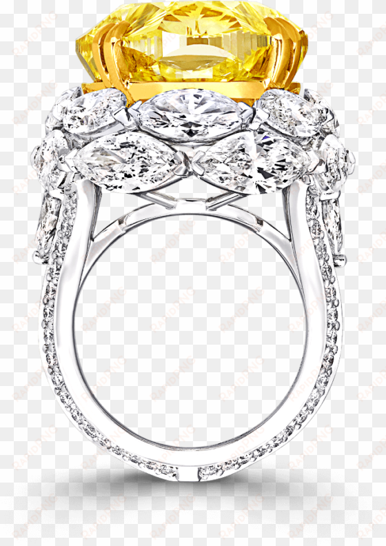 a graff yellow and white diamond ring featuring a fancy - engagement ring