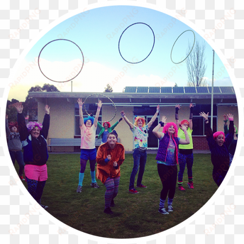 group with wigs throwing hula hoops into the air at - melbourne