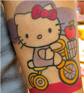 hello kitty on bike color ink tattoo - hello kitty tattoos