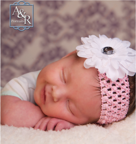 newborn baby girl at a and r portraits durand copy