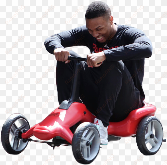 persondamian lillard riding a little red car - idaho